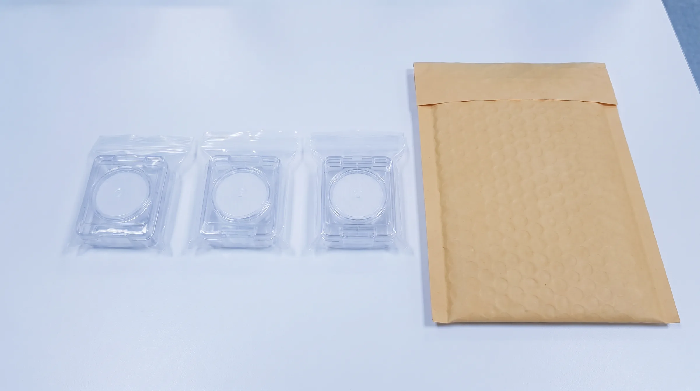 Sealed laboratory sample cassettes prepared for post-remediation clearance testing